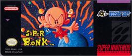 Top of cartridge artwork for Super Bonk on the Nintendo SNES.
