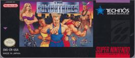 Top of cartridge artwork for The Combatribes on the Nintendo SNES.