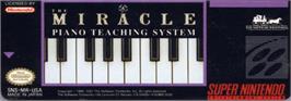 Top of cartridge artwork for The Miracle Piano Teaching System on the Nintendo SNES.