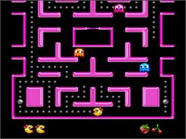 In game image of Ms. Pac-Man on the Nintendo SNES.