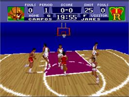 In game image of NCAA Basketball on the Nintendo SNES.
