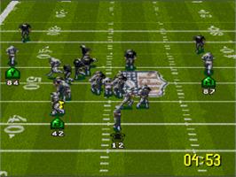 In game image of NFL Quarterback Club '96 on the Nintendo SNES.