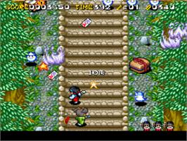 In game image of Pocky & Rocky 2 on the Nintendo SNES.