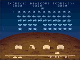 In game image of Space Invaders on the Nintendo SNES.