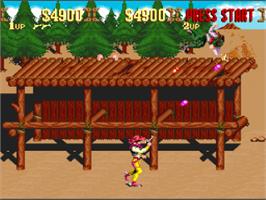 In game image of Sunset Riders on the Nintendo SNES.
