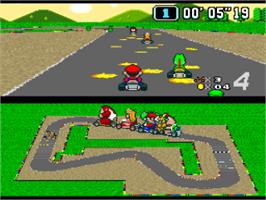 In game image of Super Mario Kart on the Nintendo SNES.