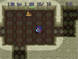 In game image of Torneko no Daibouken - Fushigi no Dungeon on the Nintendo SNES.