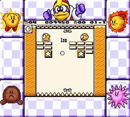 In game image of Kirby's Block Ball on the Nintendo Super Gameboy.