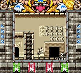 In game image of Wario Land II on the Nintendo Super Gameboy.