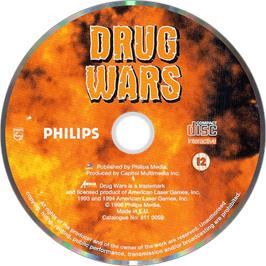 Artwork on the Disc for Drug Wars on the Philips CD-i.