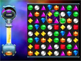 In game image of Bejeweled Twist on the PopCap.