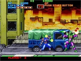 In game image of Eight Man on the SNK Neo-Geo AES.