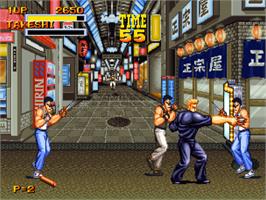 In game image of Burning Fight on the SNK Neo-Geo CD.