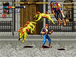 In game image of Mutation Nation on the SNK Neo-Geo CD.