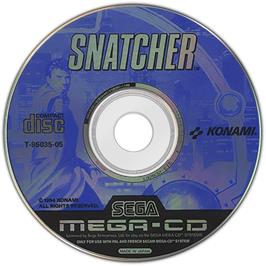 Artwork on the Disc for Snatcher on the Sega CD.