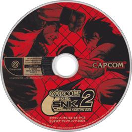 Artwork on the Disc for Capcom vs. SNK 2: Mark of the Millennium on the Sega Dreamcast.