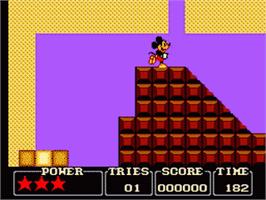 In game image of Castle of Illusion starring Mickey Mouse on the Sega Game Gear.