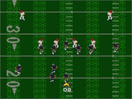 In game image of Madden NFL '95 on the Sega Game Gear.