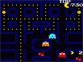In game image of Pac-Man on the Sega Game Gear.