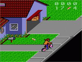 In game image of Paperboy 2 on the Sega Game Gear.