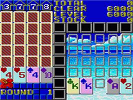 In game image of Solitaire Poker on the Sega Game Gear.