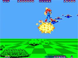 In game image of Space Harrier on the Sega Game Gear.