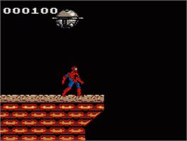 In game image of Spider-Man and the X-Men: Arcade's Revenge on the Sega Game Gear.