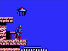 In game image of Superman: The Man of Steel on the Sega Game Gear.