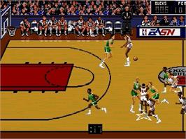 In game image of Bulls vs. Blazers and the NBA Playoffs on the Sega Genesis.