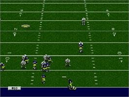 In game image of College Football's National Championship on the Sega Genesis.