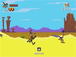 In game image of Desert Demolition Starring Road Runner and  Wile E. Coyote on the Sega Genesis.