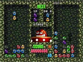 In game image of Dr. Robotnik's Mean Bean Machine on the Sega Genesis.