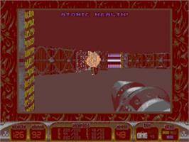 In game image of Duke Nukem 3D on the Sega Genesis.