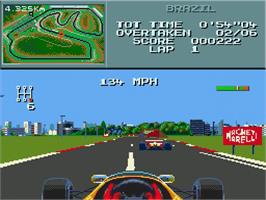 In game image of F1 on the Sega Genesis.