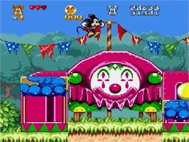 In game image of Great Circus Mystery, The - starring Mickey and Minnie Mouse on the Sega Genesis.