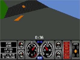 In game image of Hard Drivin' on the Sega Genesis.