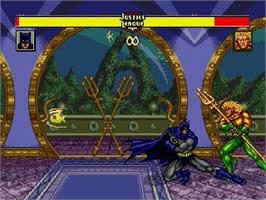 In game image of Justice League Task Force on the Sega Genesis.