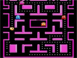 In game image of Ms. Pac-Man on the Sega Genesis.