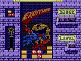 In game image of Pac-Attack on the Sega Genesis.