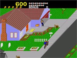 In game image of Paperboy on the Sega Genesis.