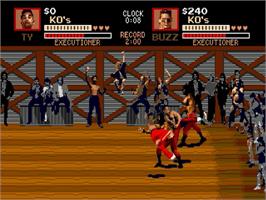 In game image of Pit Fighter on the Sega Genesis.