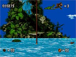In game image of Pitfall: The Mayan Adventure on the Sega Genesis.