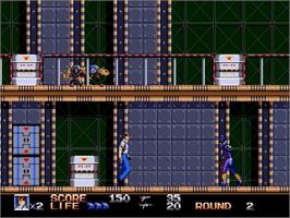 In game image of Rolling Thunder 3 on the Sega Genesis.