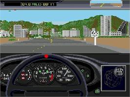 In game image of Test Drive II - The Duel on the Sega Genesis.