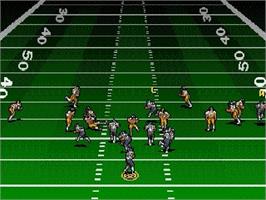 In game image of Troy Aikman NFL Football on the Sega Genesis.