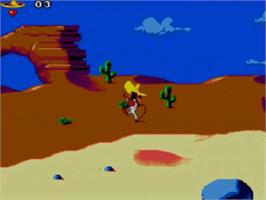 In game image of Cheese Cat-Astrophe starring Speedy Gonzales on the Sega Master System.