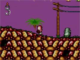 In game image of Chuck Rock 2: Son of Chuck on the Sega Master System.