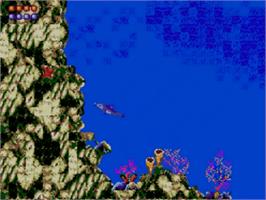 In game image of Ecco the Dolphin on the Sega Master System.