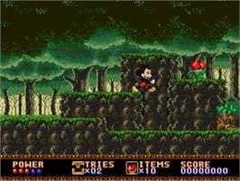 In game image of Castle of Illusion starring Mickey Mouse on the Sega Nomad.