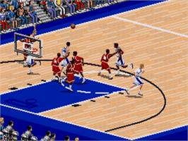 In game image of Coach K College Basketball on the Sega Nomad.